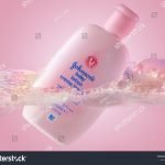 stock-photo-pink-johnson-s-baby-lotion-swimming-in-foamy-water-skin-care-moisturizing-product-in-plastic-1825321460